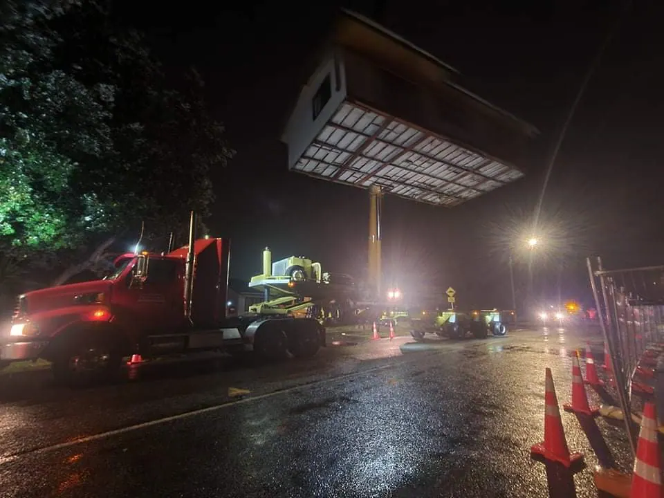 Night crane hoisting house section