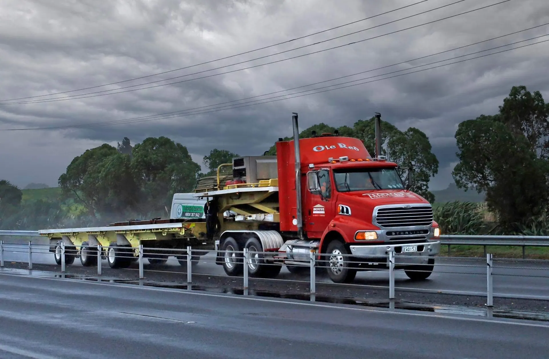 House Transporters Sterling truck Ole Red hauling across the North Island